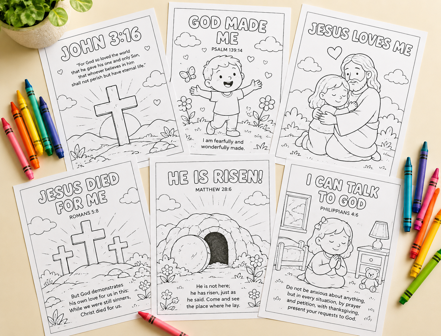Printed coloring pages spread on a table with crayons